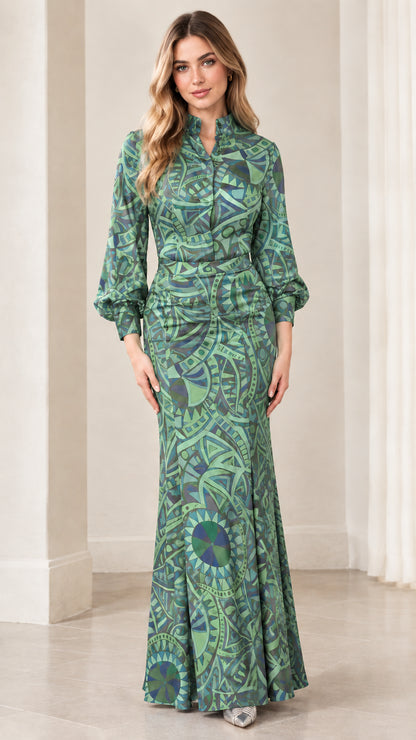 Model wearing sage green geometric print long sleeve maxi gown
