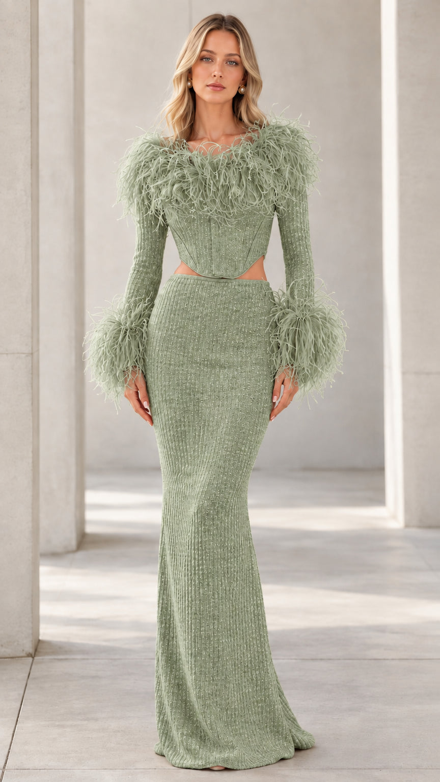 Front view of model wearing Sage Green feather-trim corset maxi dress