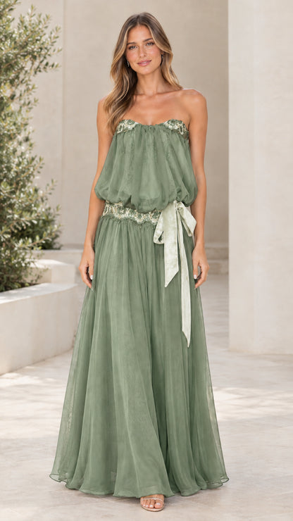 Model wearing Sage Green strapless blouson maxi dress