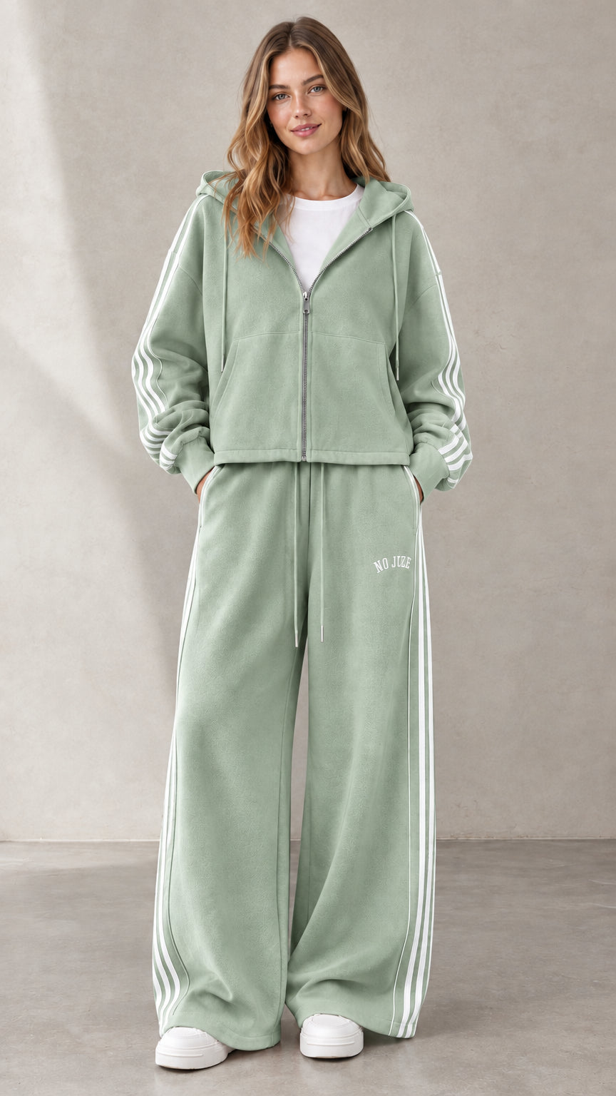 Woman wearing Sage Green two-piece side-stripe tracksuit set