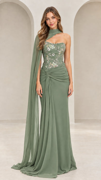 Front view of sage green floral embroidered formal maxi dress with flowing shoulder cape