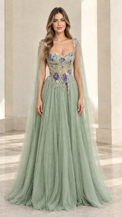 Sage green embroidered tulle evening gown with sheer shoulder cape accents