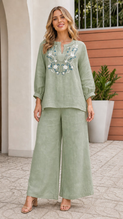 Woman wearing sage green embroidered top and wide leg pants set