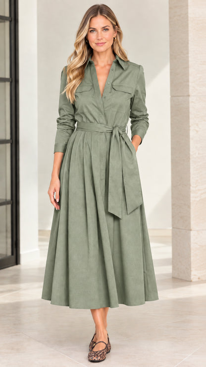 Model wearing sage green long sleeve belted A-line midi shirt dress