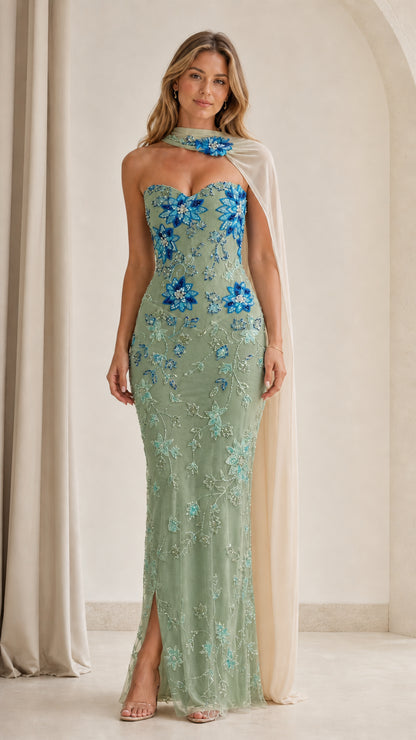 Model wearing sage green floral sequin strapless evening gown