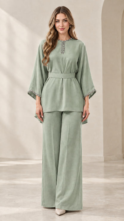 Full-length front view of sage green rhinestone-embellished tunic top and wide-leg pants set