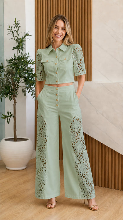 Model wearing sage green eyelet crochet two-piece set