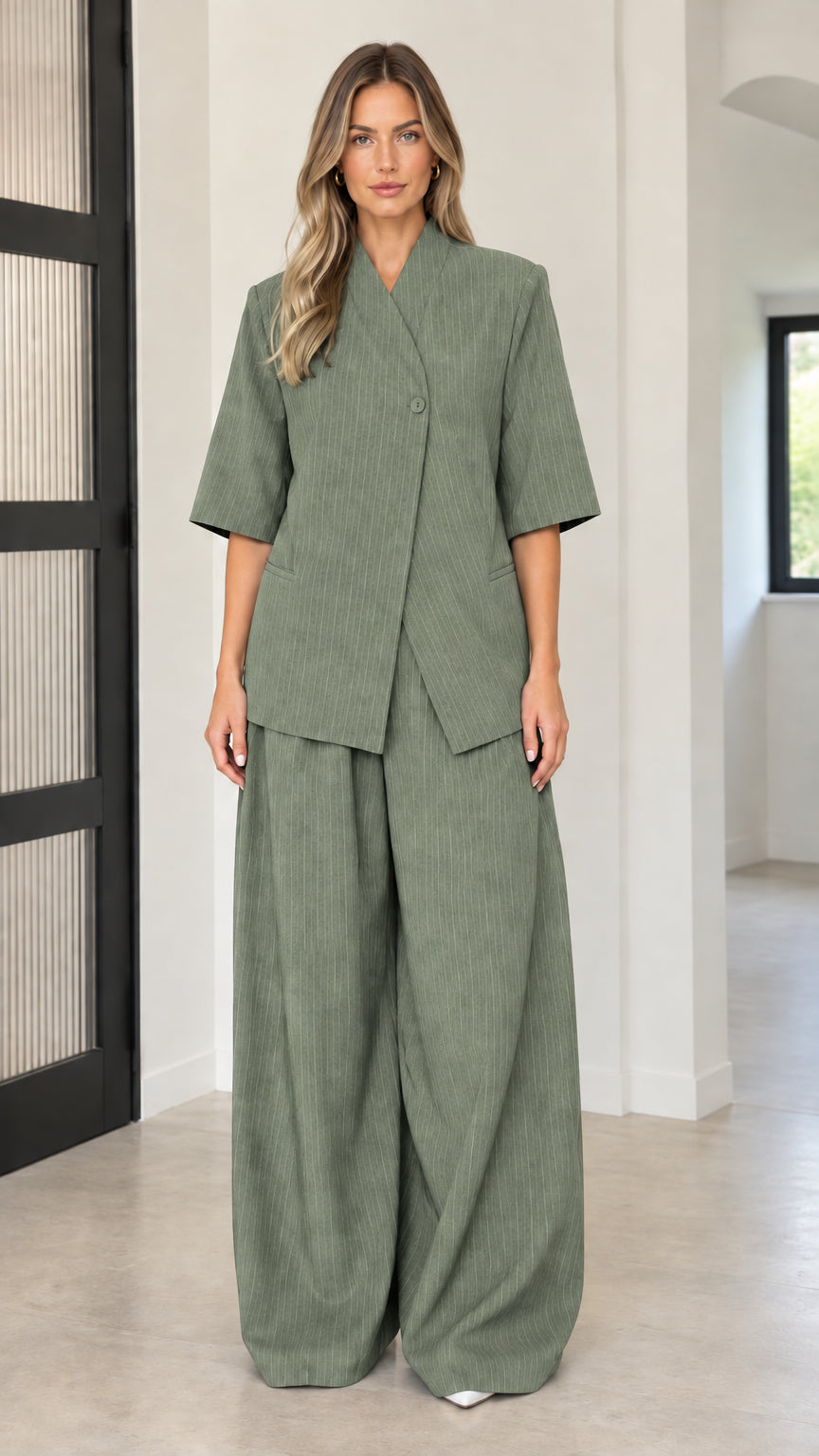 Front full-length view of model wearing Sage Green short sleeve blazer and pant set