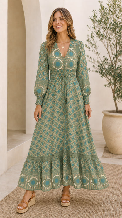 Full front view of model wearing Sage Green geometric print tiered maxi dress