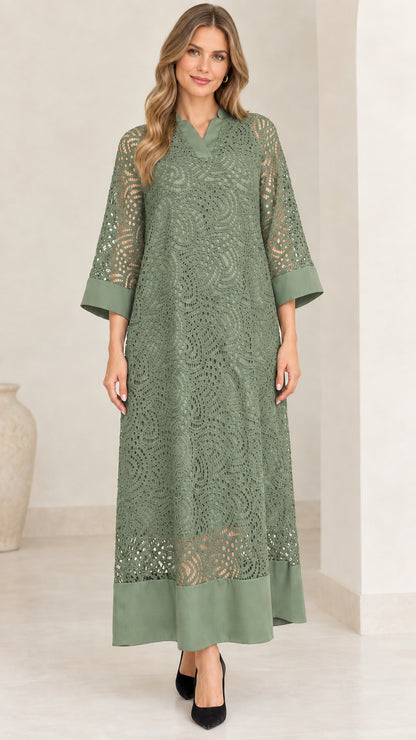 Model wearing sage green lace overlay maxi dress with 3/4 sleeves
