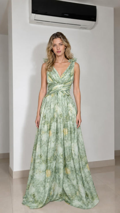 Model wearing sage green floral print maxi dress