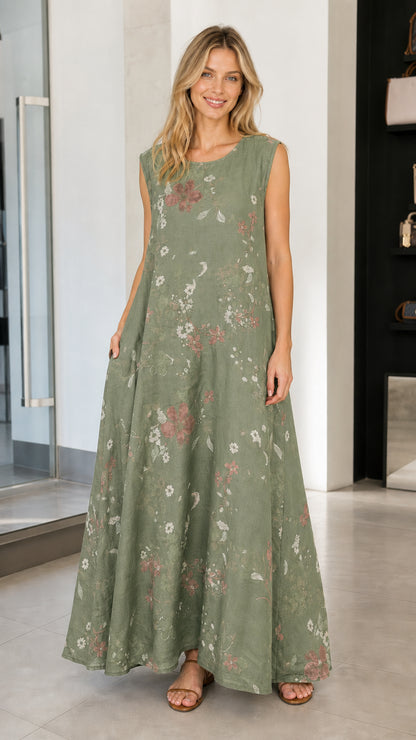 Model wearing sage green floral sleeveless maxi dress