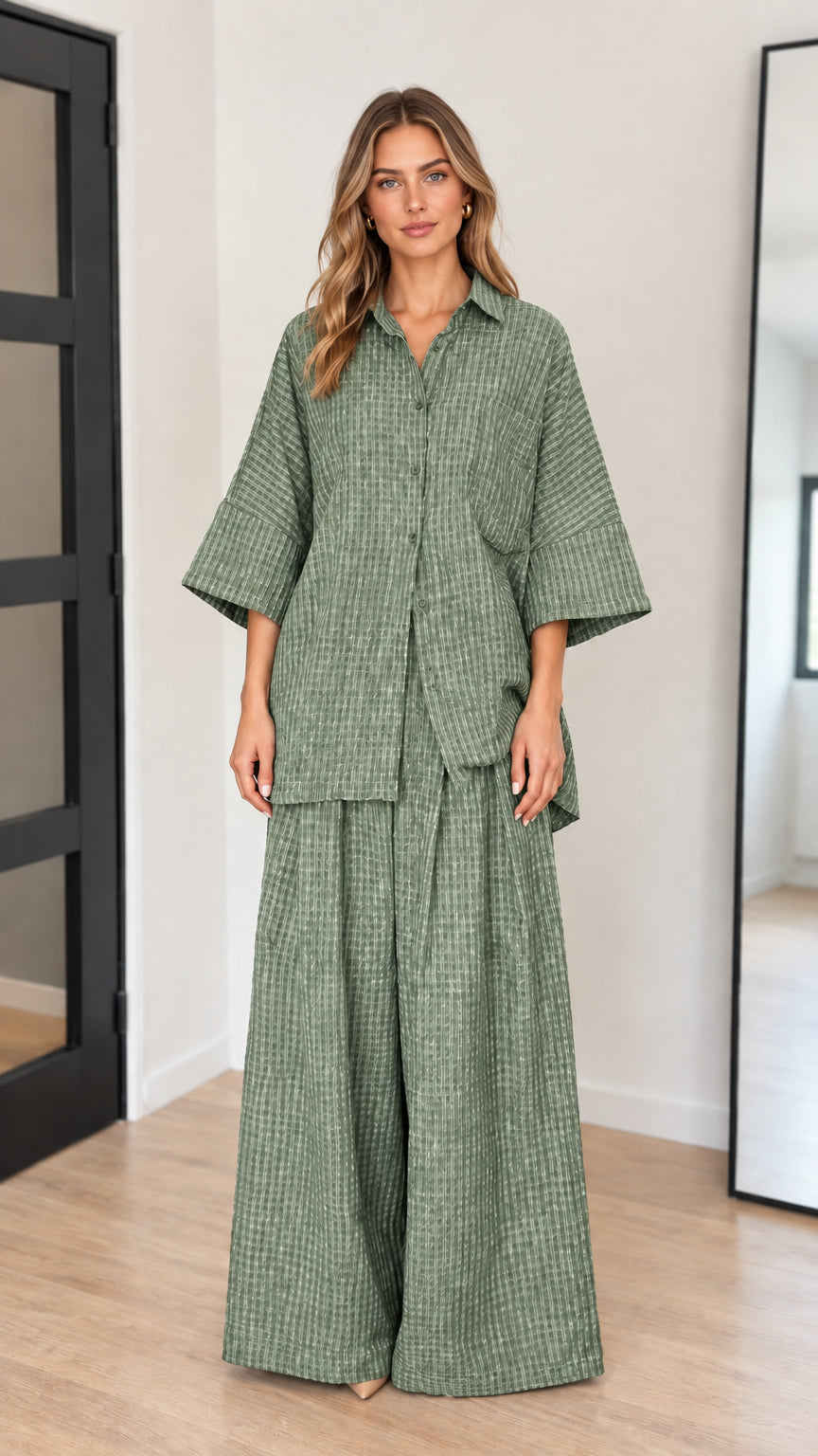 Front view of model wearing sage green textured oversized two-piece matching set