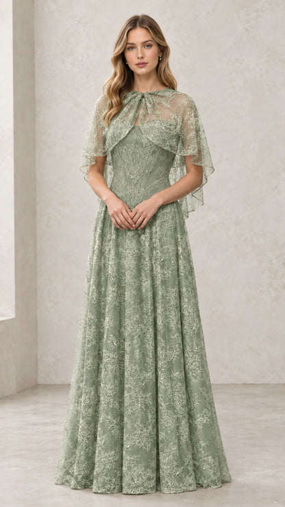 Woman wearing Sage Green embroidered lace capelet formal gown