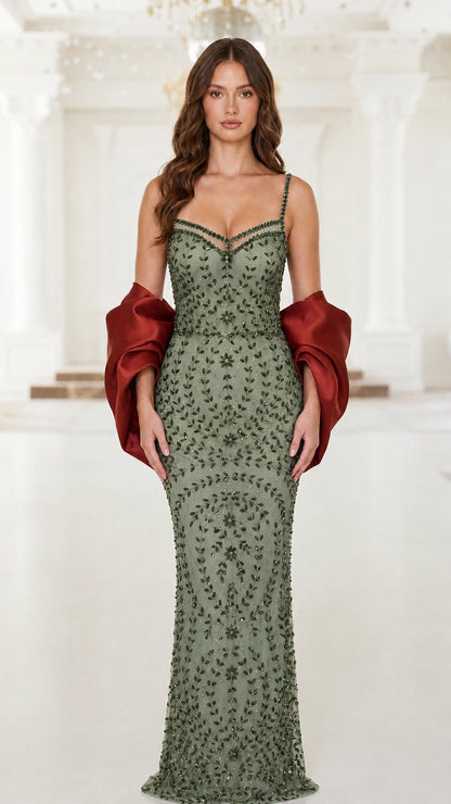 Front view of green beaded evening dress
