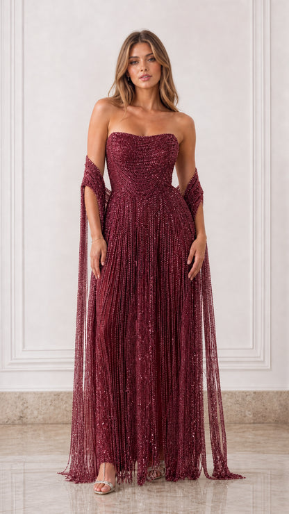 Full-length front view of burgundy wine red strapless beaded fringe evening gown