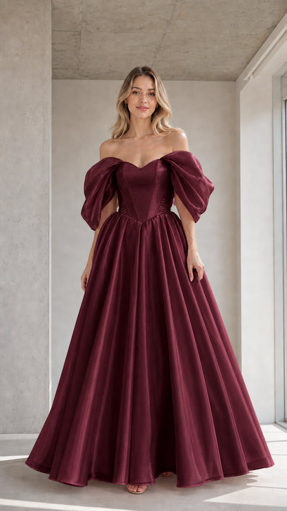 Front view of model wearing the burgundy color variant