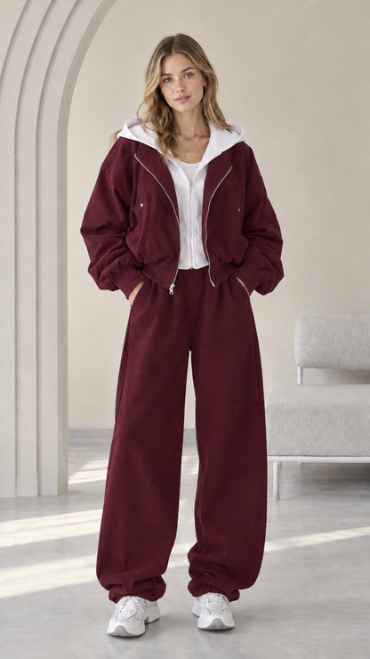 Front view of model wearing the Burgundy wine contrast hooded jacket and pants set