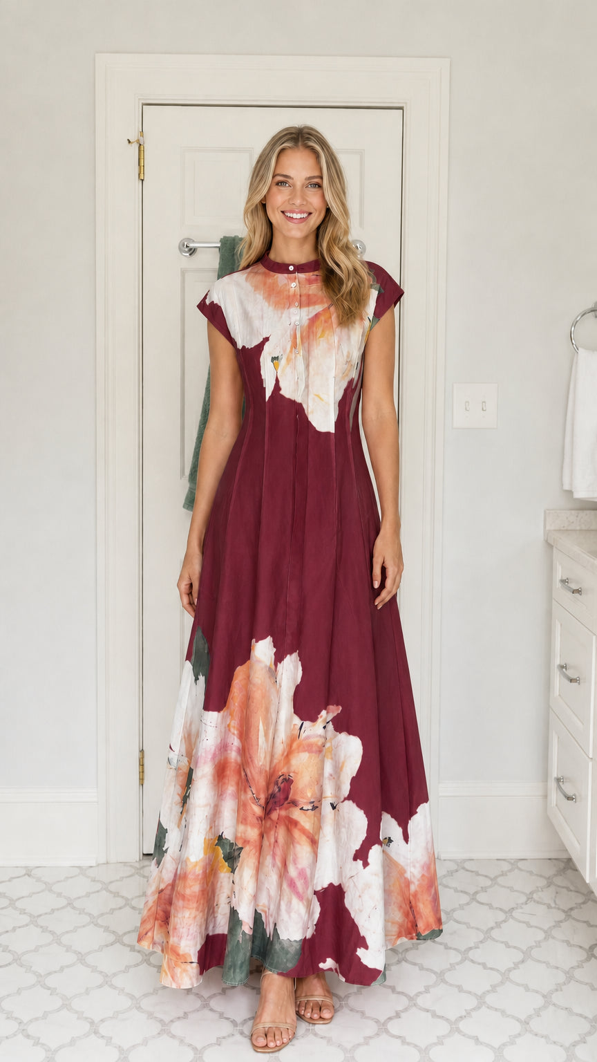 Front view of woman wearing burgundy wine watercolor floral A-line maxi dress