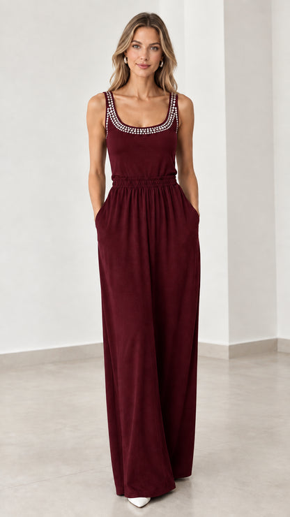 Front view of model wearing burgundy wine red rhinestone wide leg jumpsuit