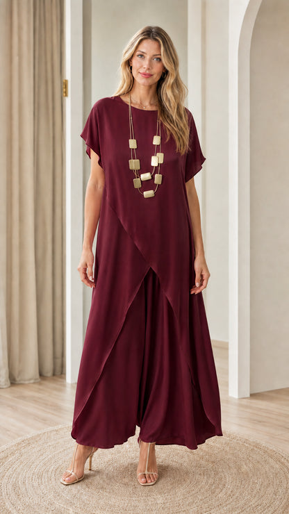 Full front view of model wearing burgundy wine-colored tulip tunic and matching wide-leg trousers