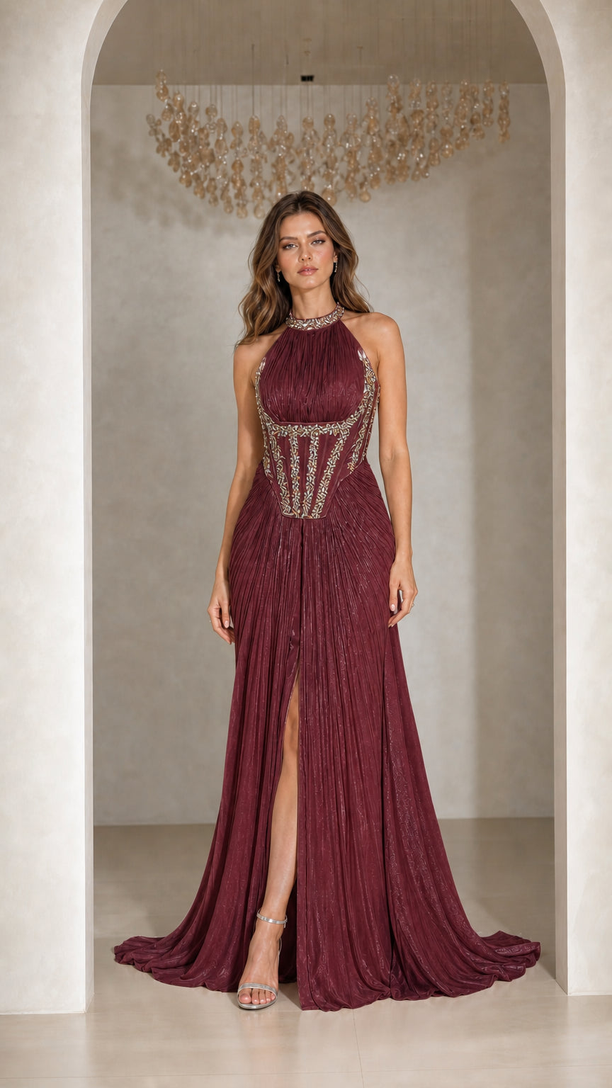 Front view of woman wearing Burgundy pleated halter corset evening gown