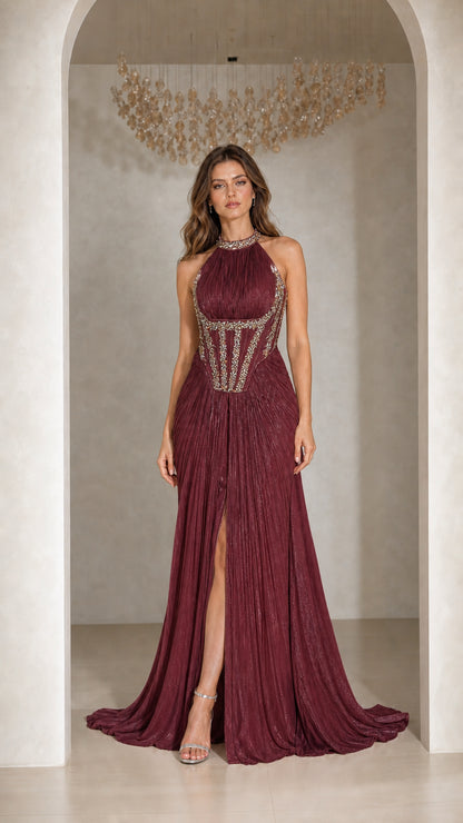 Front view of woman wearing Burgundy pleated halter corset evening gown