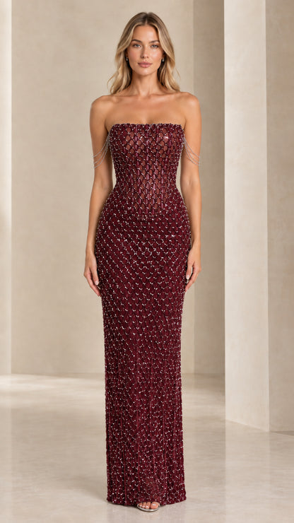 Front view of model wearing Burgundy strapless beaded corset evening dress