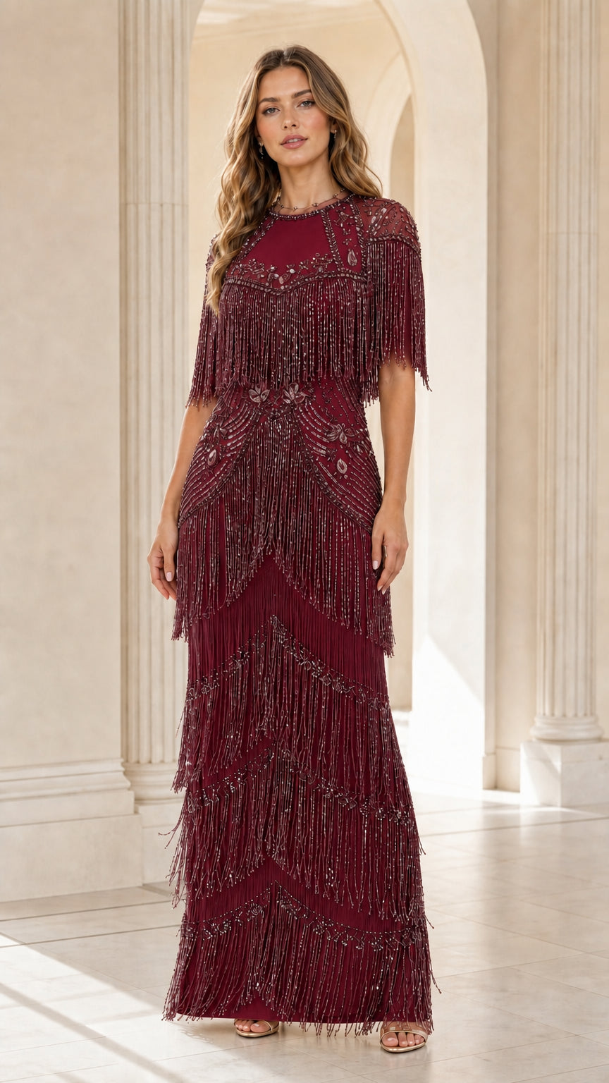 Front view of woman wearing burgundy wine red sequin fringe formal maxi dress