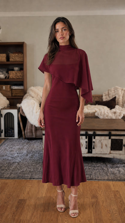 Front view of burgundy mock neck cape sleeve midi dress
