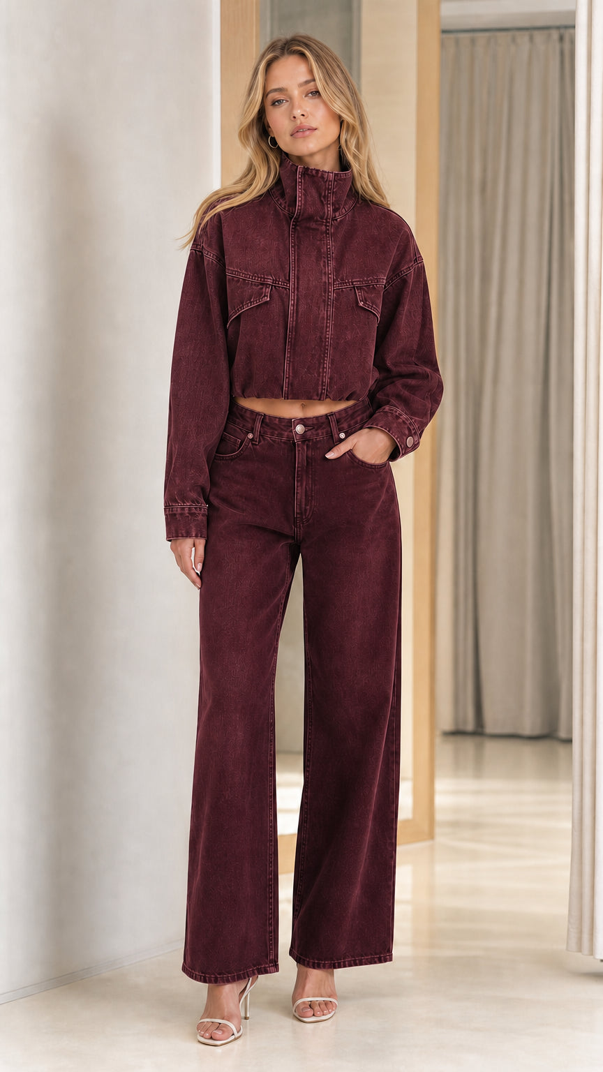 Model wearing burgundy wine washed denim cropped jacket and wide leg jeans set