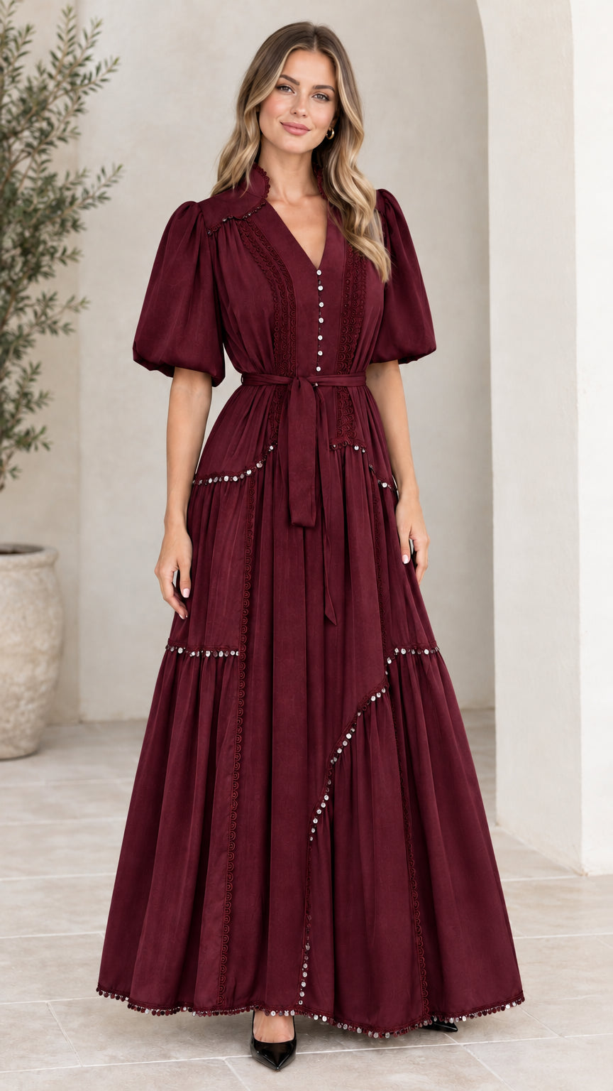 Front view of woman wearing burgundy wine tiered puff sleeve maxi dress