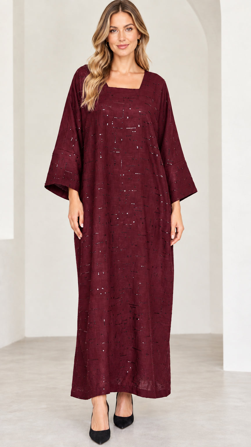 Model wearing burgundy wine sequin embellished maxi dress