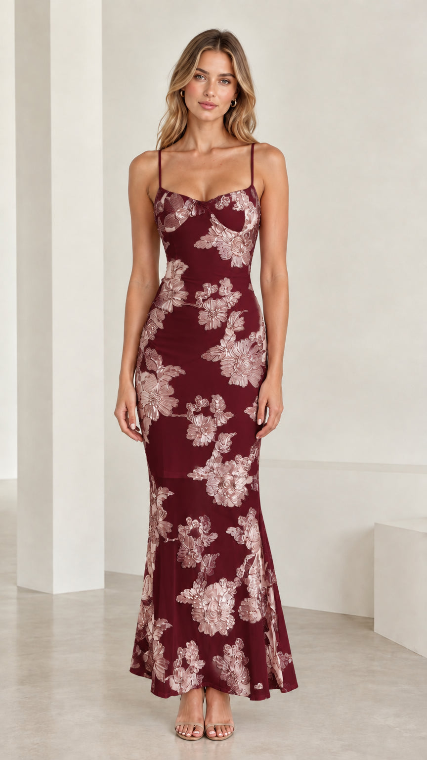Model wearing Burgundy floral embroidered corset mermaid maxi dress front view