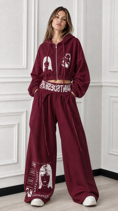 Full front view of burgundy maroon 2-piece cropped zip hoodie and wide-leg graphic sweatpants set