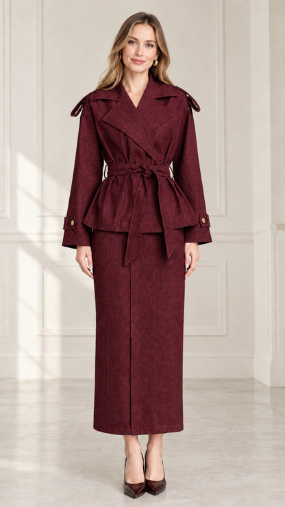 Front full-length view of women's burgundy wine belted trench jacket and maxi skirt suit