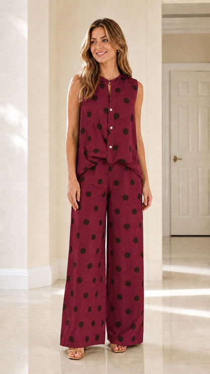 Front view of burgundy polka dot matching set
