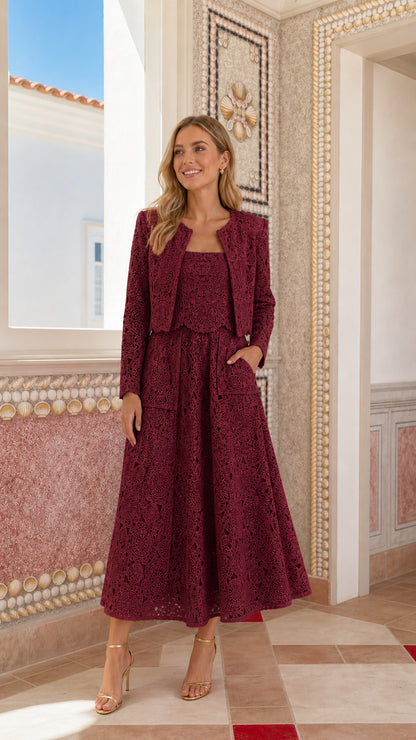 Woman wearing burgundy lace crop jacket and midi dress set