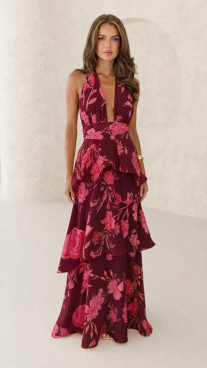 Front view of burgundy floral halter neck maxi dress
