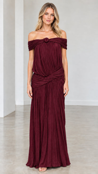 Full-length front view of model wearing Burgundy pleated evening gown