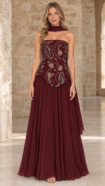 Front full view of burgundy red strapless evening dress with embellished bodice