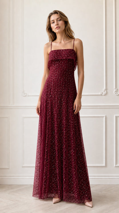 Model wearing burgundy wine red sequin embroidered evening gown
