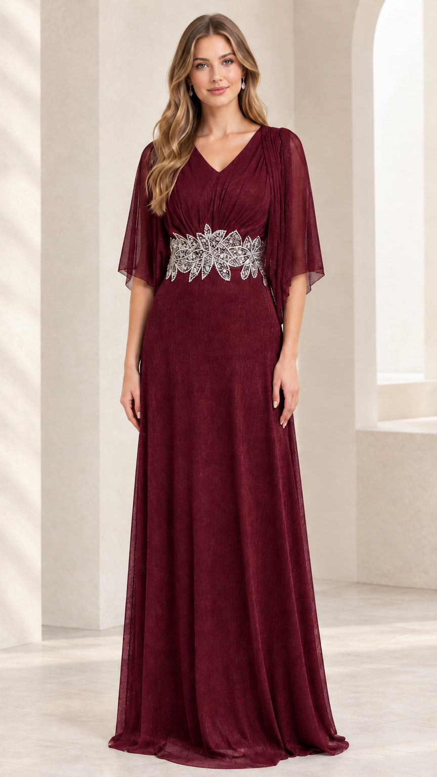 Model wearing rich burgundy wine red flutter sleeve maxi evening gown