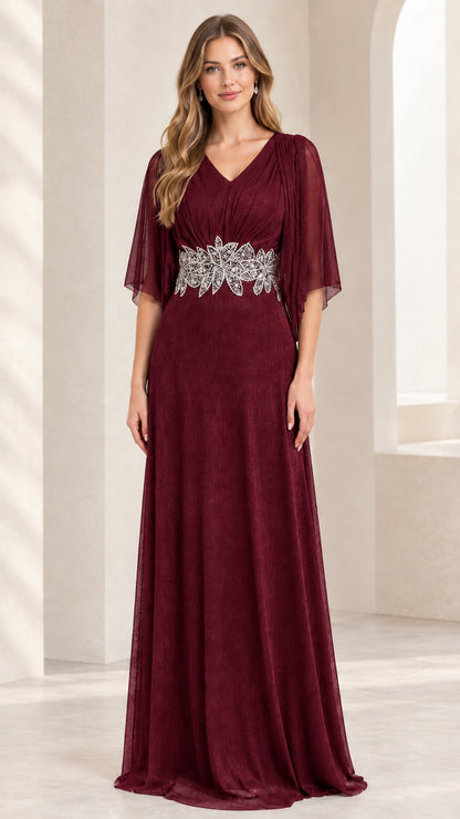 Model wearing rich burgundy wine red flutter sleeve maxi evening gown