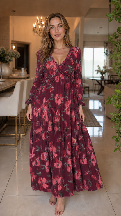Front view of burgundy floral long sleeve tiered maxi dress