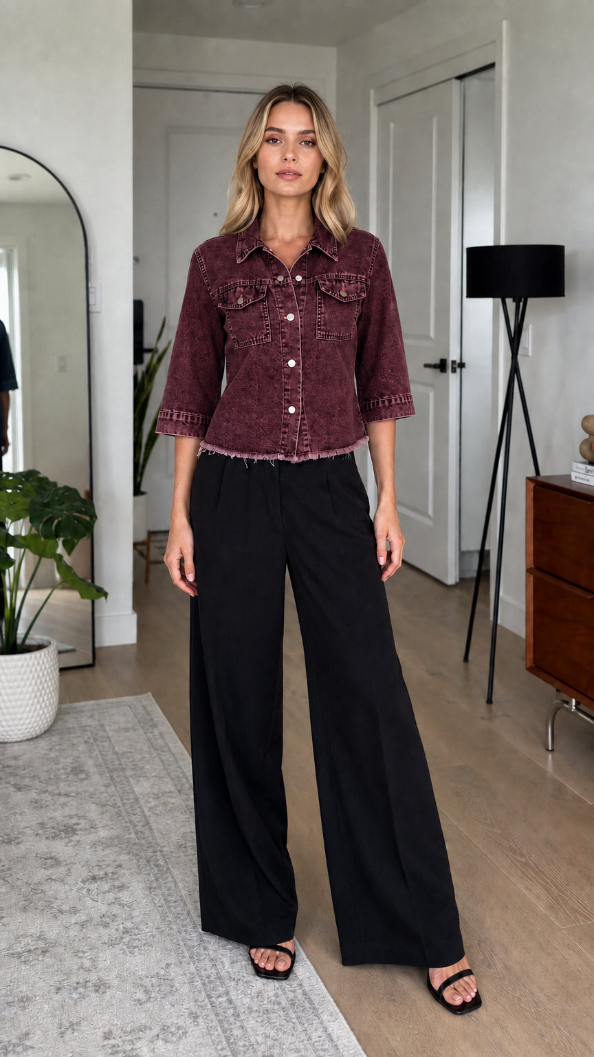 Model wearing burgundy wash denim shirt jacket