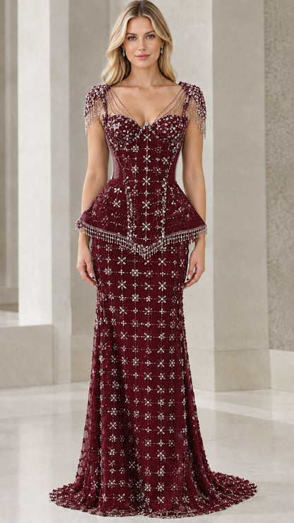 Front view of model wearing burgundy beaded corset peplum evening gown