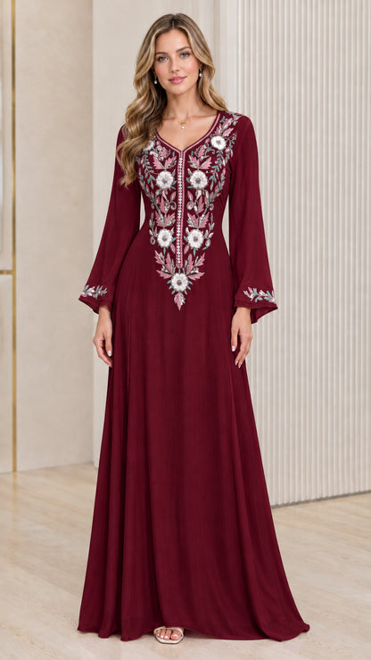 Front view of woman wearing Burgundy wine red embroidered long sleeve evening gown