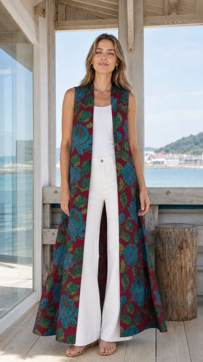 Model wearing burgundy floral maxi duster vest