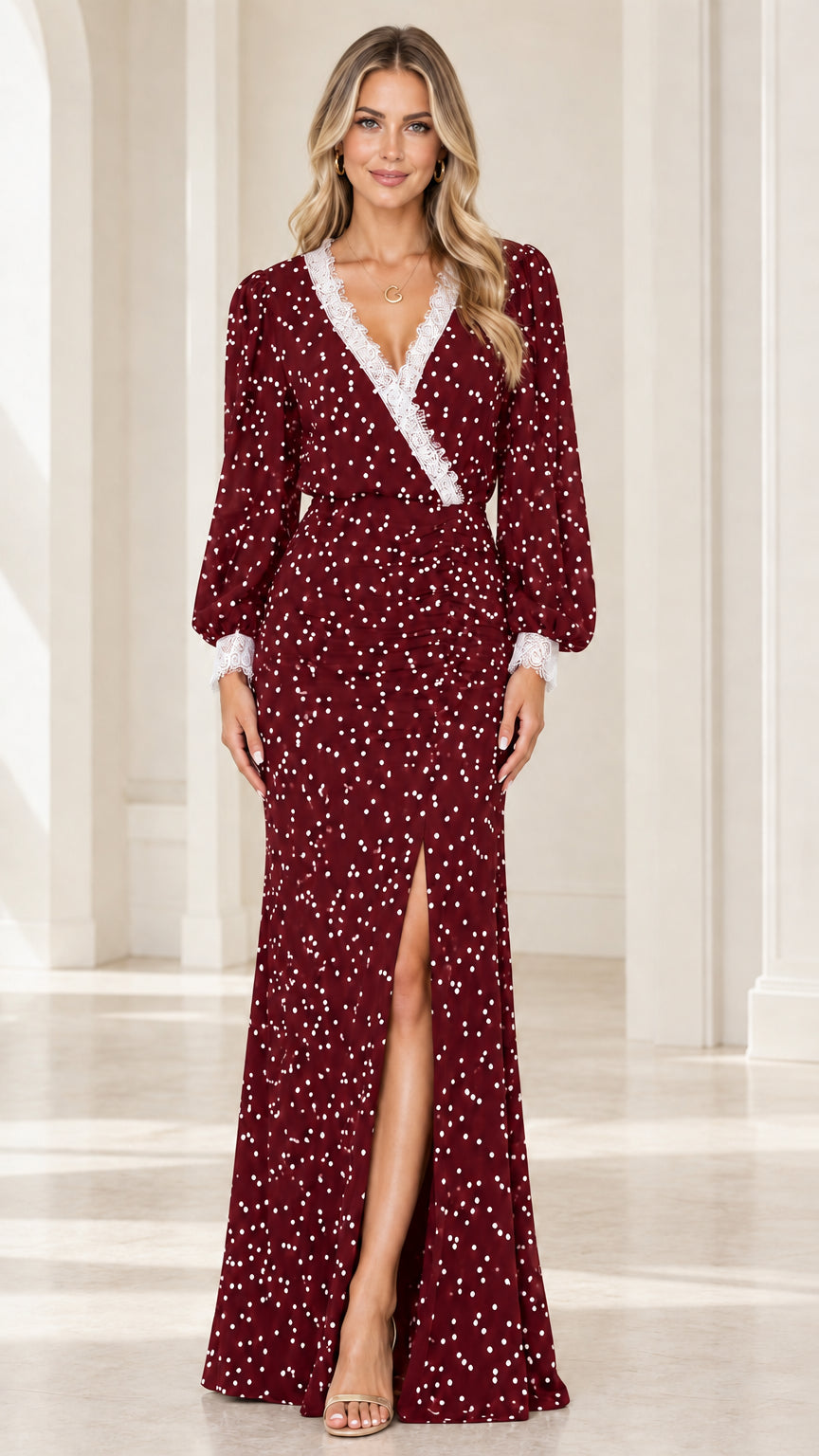 Front view of burgundy red polka dot evening maxi dress with lace trim
